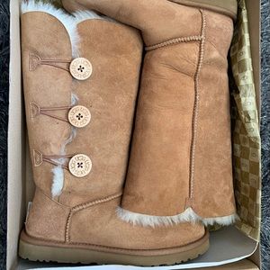 Woman’s Ugg tall boots, chestnut size 8